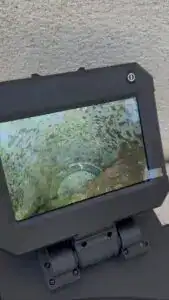 Image écran caméra inspection vidéo montrant un bouchon dans une canalisation